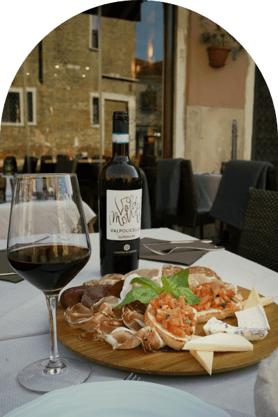 Wine pouring over a dinner table