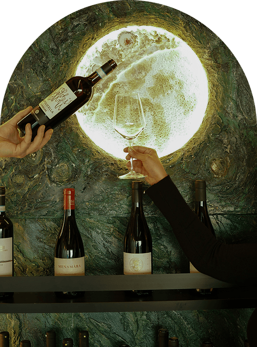 Wine pouring over a dinner table